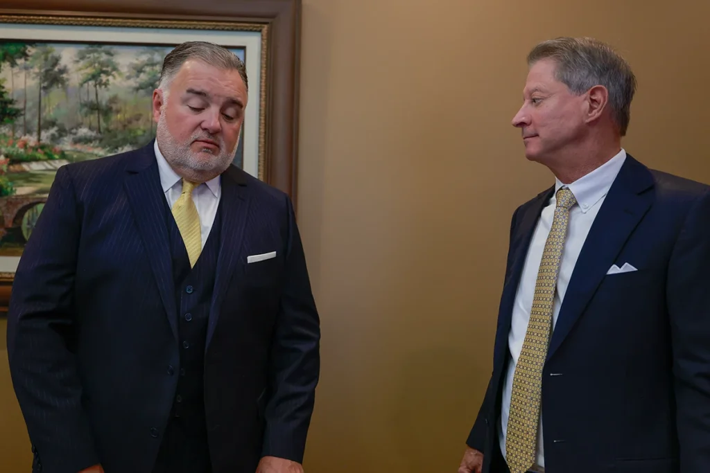 Attorney tom mccutcheon and joel hamner plan litigation over a failed medical implant that harmed a patient.