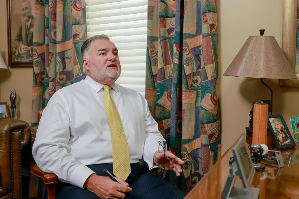 Joel hamner joins tom mccutcheon to evaluate a defective tire claim with a client.