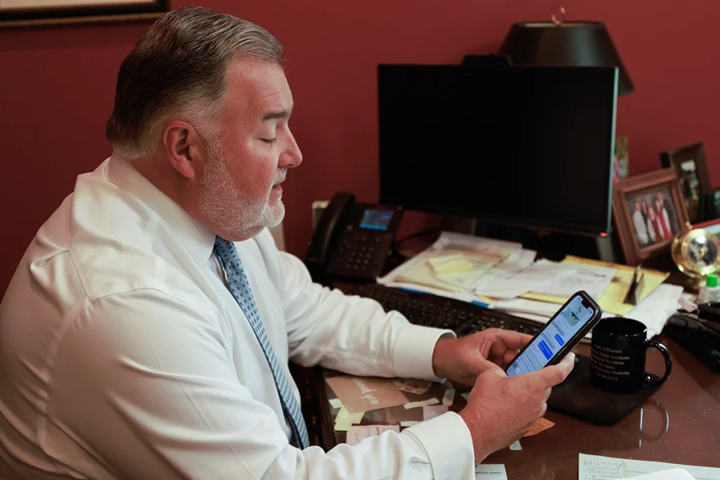 Lawyer joel hamner presents an instacart accident exhibit to a client, covering delivery route details.