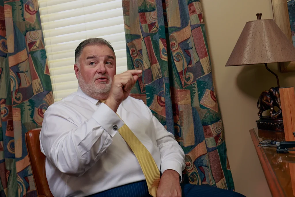 Lawyers tom mccutcheon and joel hamner strategize on a catastrophic limb loss claim and long term medical needs.