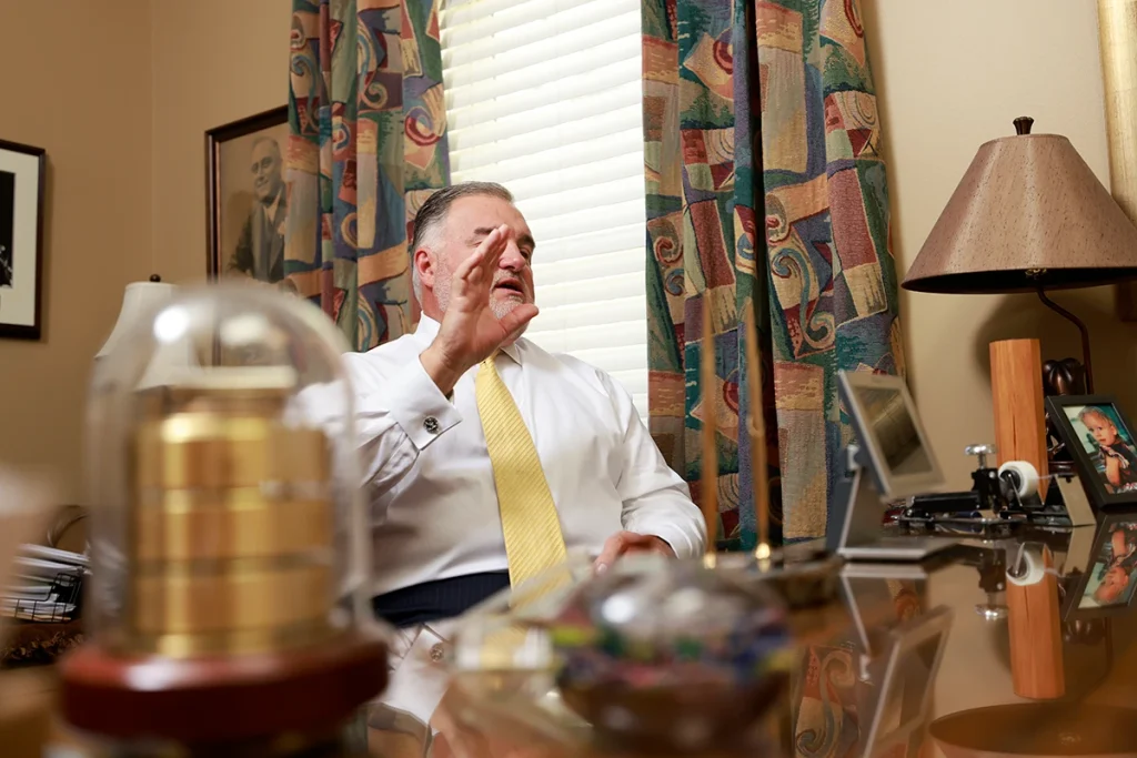 Lawyers tom mccutcheon and joel hamner strategize on a high speed collision lawsuit.