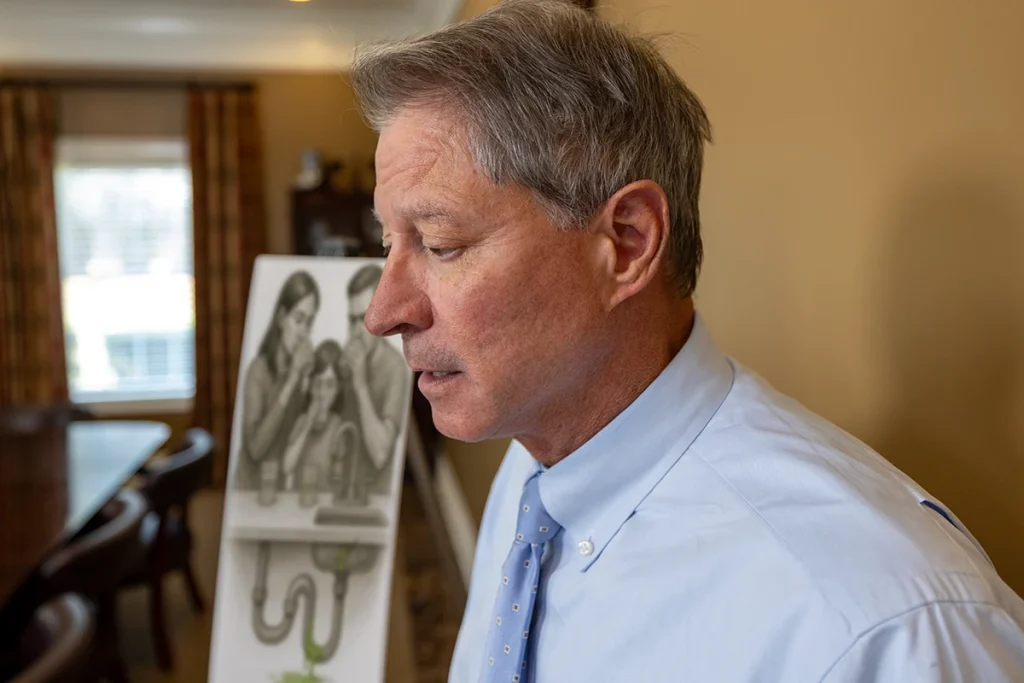 Personal injury attorney tom mccutcheon consults with a client about a water contamination injury claim.