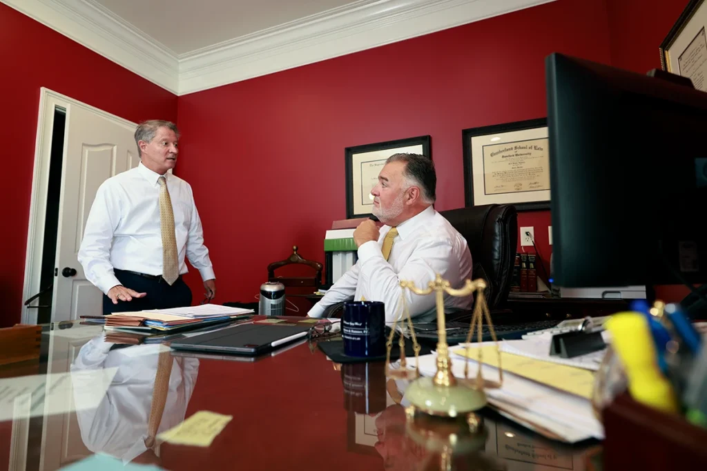 Tom mccutcheon and joel hamner analyze contamination data while preparing a toxic chemical exposure claim.