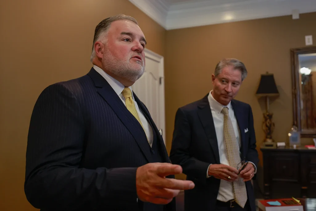 Tom mccutcheon and attorney joel hamner review recall records while preparing a faulty airbag lawsuit.
